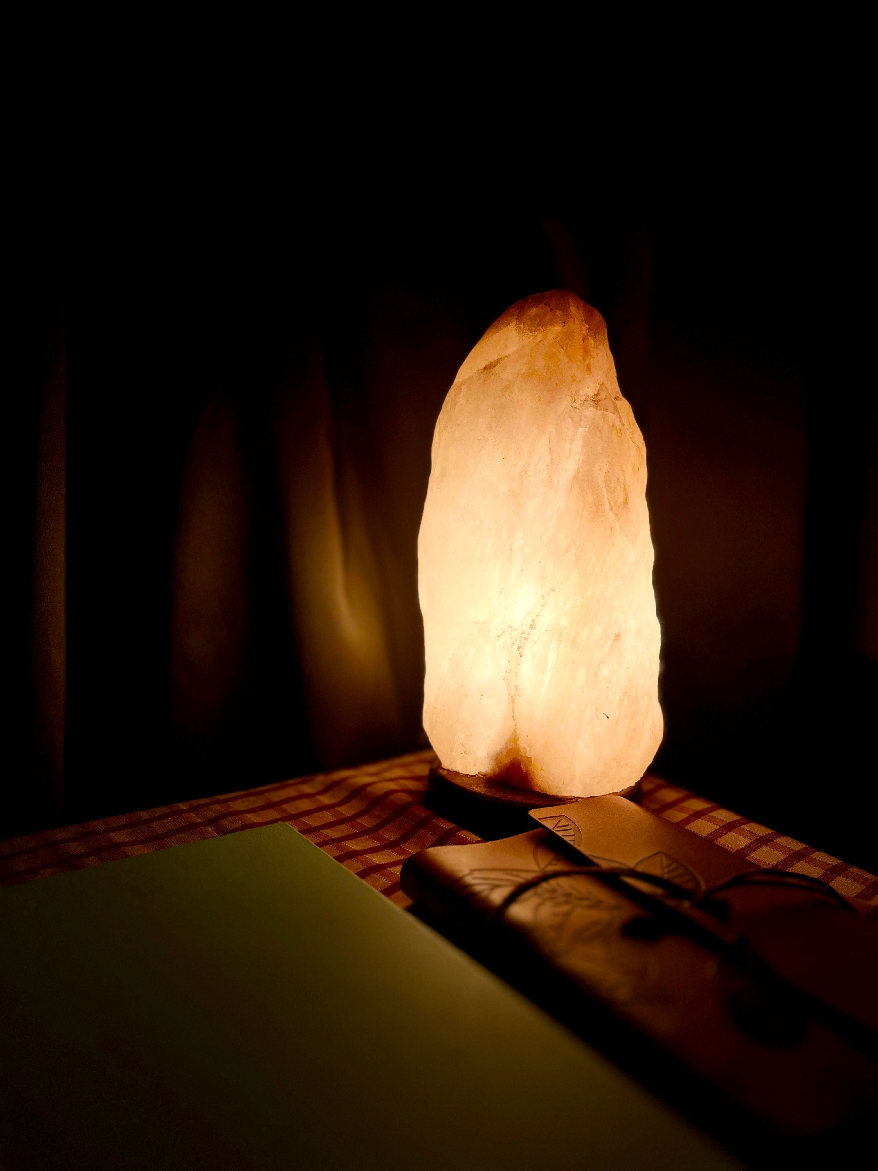 Himalayan salt crystal lamp glowing